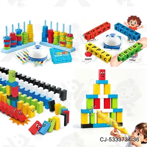 Kids stacking dominoes game set with shooting chicken, colorful building blocks and fun board toy.