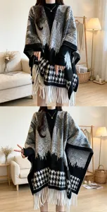Detailed view of the stylish black and white houndstooth plaid fringe knitted poncho cloak.