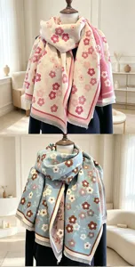 Detail view of winter cashmere feel floral pattern scarf with fringe, warm and cozy neck wrap.