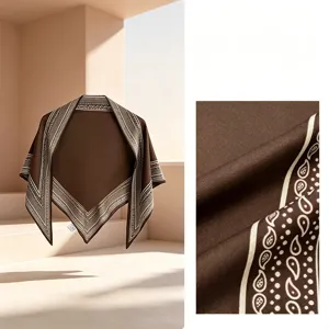 Elegant brown diagonal triangle silk scarf with classic paisley print pattern for women.