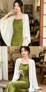 Elegant green satin slip dress paired with a sheer white chiffon cape shawl for women.