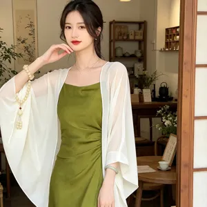 Elegant sheer chiffon cape and green slip dress set, versatile stylish sun protection cardigan.