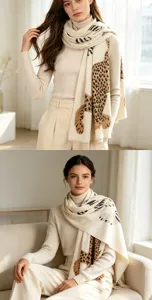 Detail view of the stylish beige leopard print scarf, soft and warm for autumn and winter.
