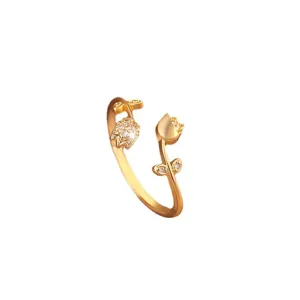 Elegant gold-plated tulip flower open ring for women, sparkling cubic zirconia detail.