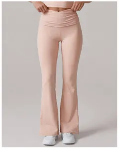High waisted flare yoga pants for women, irregular pleated stretch fitness activewear trousers.