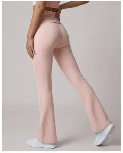 Back detail view of light pink high waist flare yoga pants, soft stretch fabric fit.