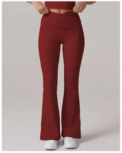 Detailed view of dark red high waist crossover flare yoga pants featuring stretchy fit.