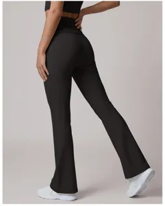 Detailed view of black high-waisted flare yoga pants showing back shaping and stretch fabric.