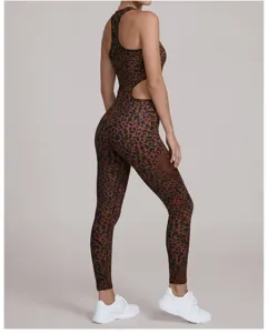 Detailed view of women's leopard print yoga jumpsuit, high stretch fabric with cutout back.