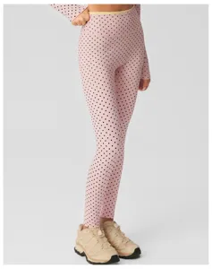 Roze polkadot yoga legging en lange mouw top set voor dames fitness en training.