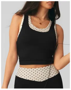 Gedetailleerd uitzicht sportbeha voor dames, zwart polkadot contrast yoga crop top fitness.