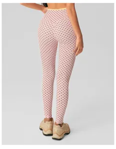 Roze polkadot yoga legging voor dames, hoge taille fitness broek voor sport training.