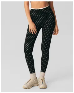 Polkadot yoga legging detail, hoge taille strakke fitnessbroek dames training hardlopen.