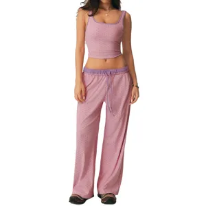Conjunto de top corto y pantalon ancho de lunares rosa de mujer vista principal foto