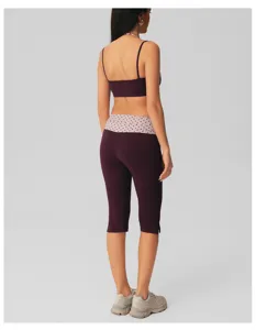 Dames sport yoga set crop top en hoge taille cropped legging met stippen taille.