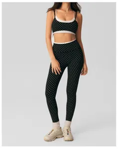 Black white polka dot yoga set with bra and leggings for gym fitness and cycling.