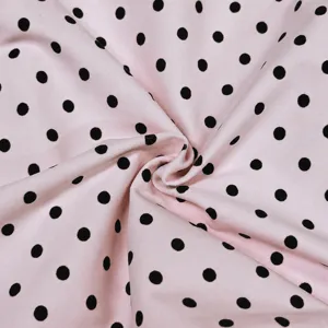 Pink and black polka dot fabric material for yoga wear apparel and active sportswear.