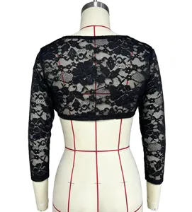 Black lace long sleeve crop top detail view, floral patterned mesh fabric for women.