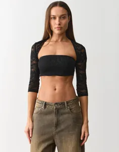 Black lace tube top and shrug set featuring delicate floral patterns and stylish design.