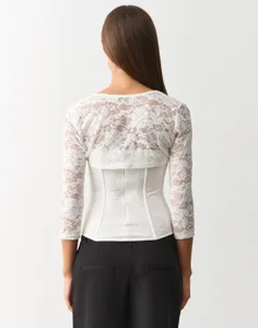 Women white floral lace long sleeve slim fit top detail view showing delicate fabric texture