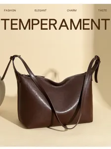 Detailed view of the retro brown frosted leather shoulder bag, casual hobo dumpling bag design.
