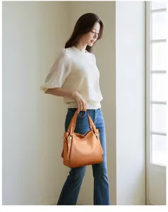 Elegant large capacity shoulder handbag for women, premium soft PU leather crossbody bag.