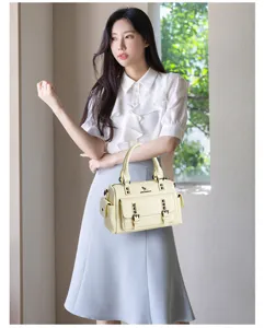 Retro women leather handbag with rivets and double pockets, stylish casual shoulder satchel.