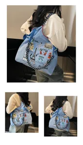 Stylish women's large capacity embroidered canvas shoulder bag with Paris landmark design.