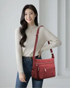 Women nylon crossbody shoulder bag casual multi-pocket lightweight travel handbag for ladies.