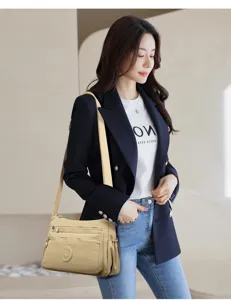 Stylish nylon shoulder bag with multi-zipper pockets for casual daily travel and women fashion.