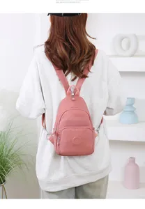 Zaino multifunzionale elegante in nylon da donna borsa da petto da viaggio rosa chiaro