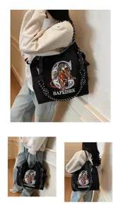 Canvas shoulder bag with large capacity, stylish embroidered lion pattern for daily commute.