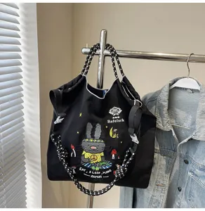 Large capacity cartoon embroidered tote bag, trendy cute casual single shoulder handbag for women.