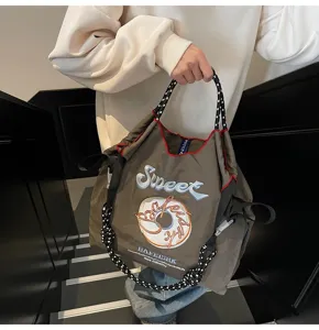 Japanese embroidery nylon women tote bag with sweet donut pattern and durable rope handles.