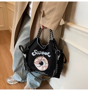 Japanese embroidered nylon tote bag, casual stylish shoulder bag for everyday use.