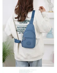 Casual nylon sling chest bag detail showing adjustable strap and zipper pocket design.