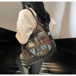 Large capacity nylon shoulder bag with Paris embroidery, lightweight casual crossbody travel tote.