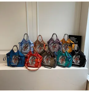 Large capacity canvas tote shoulder bag handbag with stylish embroidery and multi colors.