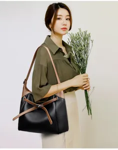 Commuter soft leather shoulder bag with stylish strap design, large capacity and elegant look.