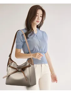 Simple soft leather shoulder bag for women, elegant daily commuter tote bag detail view.