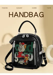 Detail view of black soft leather rhinestone backpack with luxury style rhinestones and top handle.