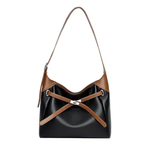 Minimalist soft leather shoulder bag for women, commuter hobo tote bag, casual daily use.