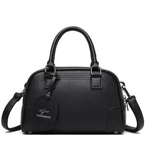 Classic black leather Boston handbag for women, stylish top-handle shoulder crossbody bag.