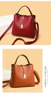 Detailed view of the soft leather bucket bag featuring a secure lock design and adjustable straps.