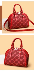 Detailed view of the red rhinestone dome shoulder bag showing exquisite lattice pattern and handles.