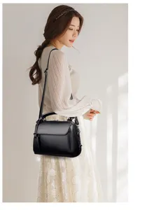 Elegant women soft leather top handle shoulder crossbody bag for daily fashion wear and travel.