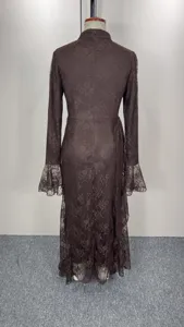 Back view detail of the dark brown lace evening dress, showing slim fit and delicate texture.