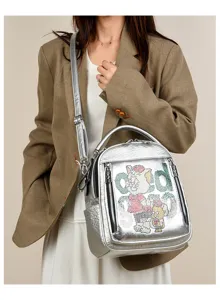 Stylish metallic silver soft leather women backpack with sparkling rhinestones. Casual bag.