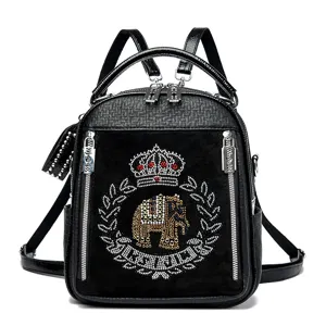 Black leather rhinestone backpack for women, stylish casual daypack featuring elephant crown motif.