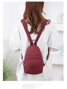 Zaino in nylon multifunzionale da donna borsa a tracolla convertibile rosso vino